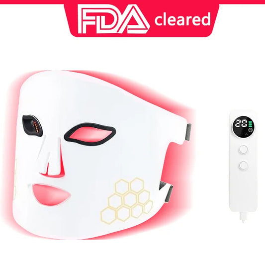 Facial mask device with digital display on a white background, featuring 'FDA cleared' text.